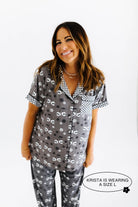 model krista wearing the size large in the skeleton pajamas