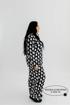 model regina showing the side of the ghost pajamas wearing size xl