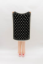 Black side of blanket with white hearts