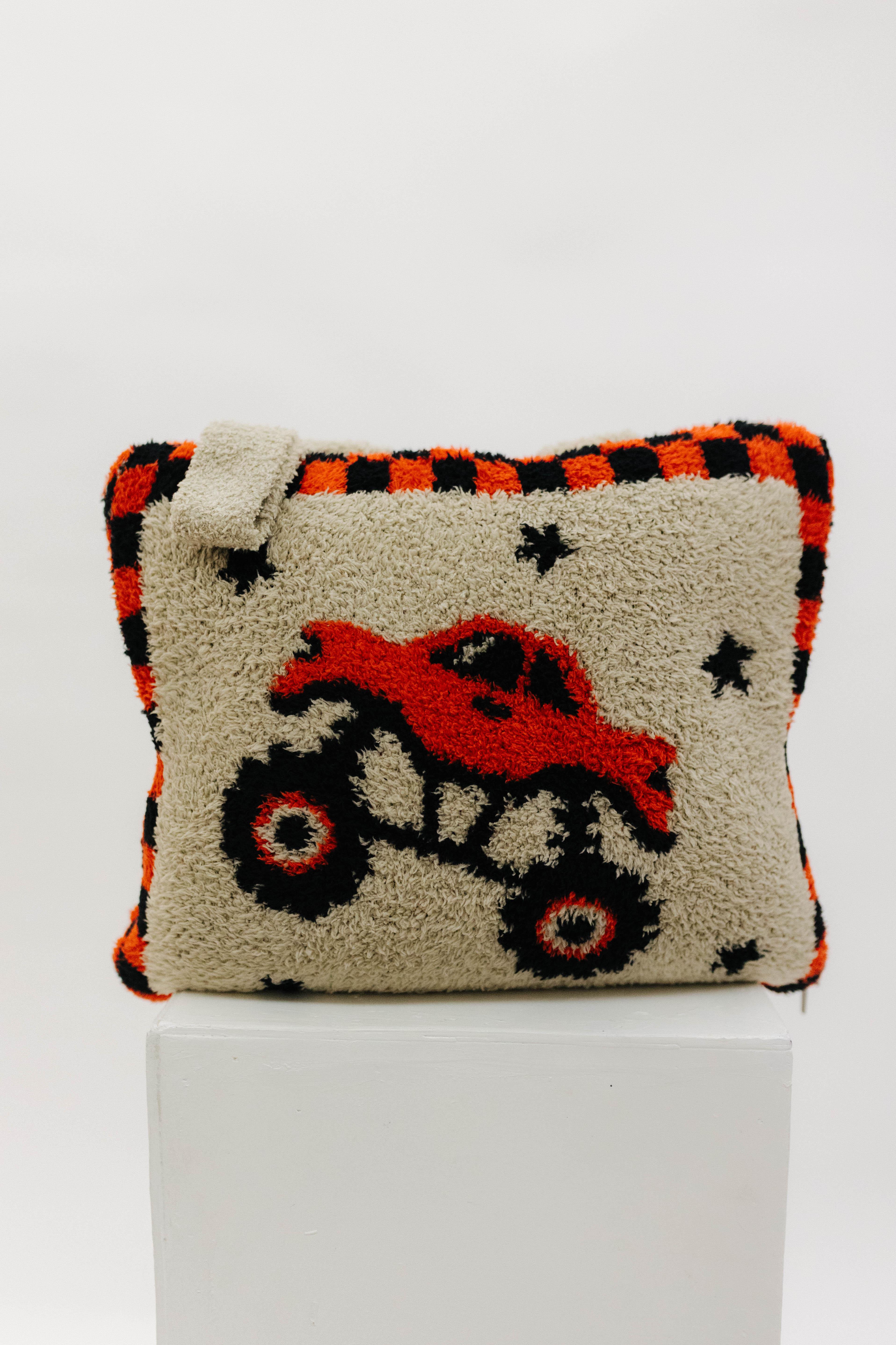 Quillow with monster truck, stars, and check on a pedestal 
