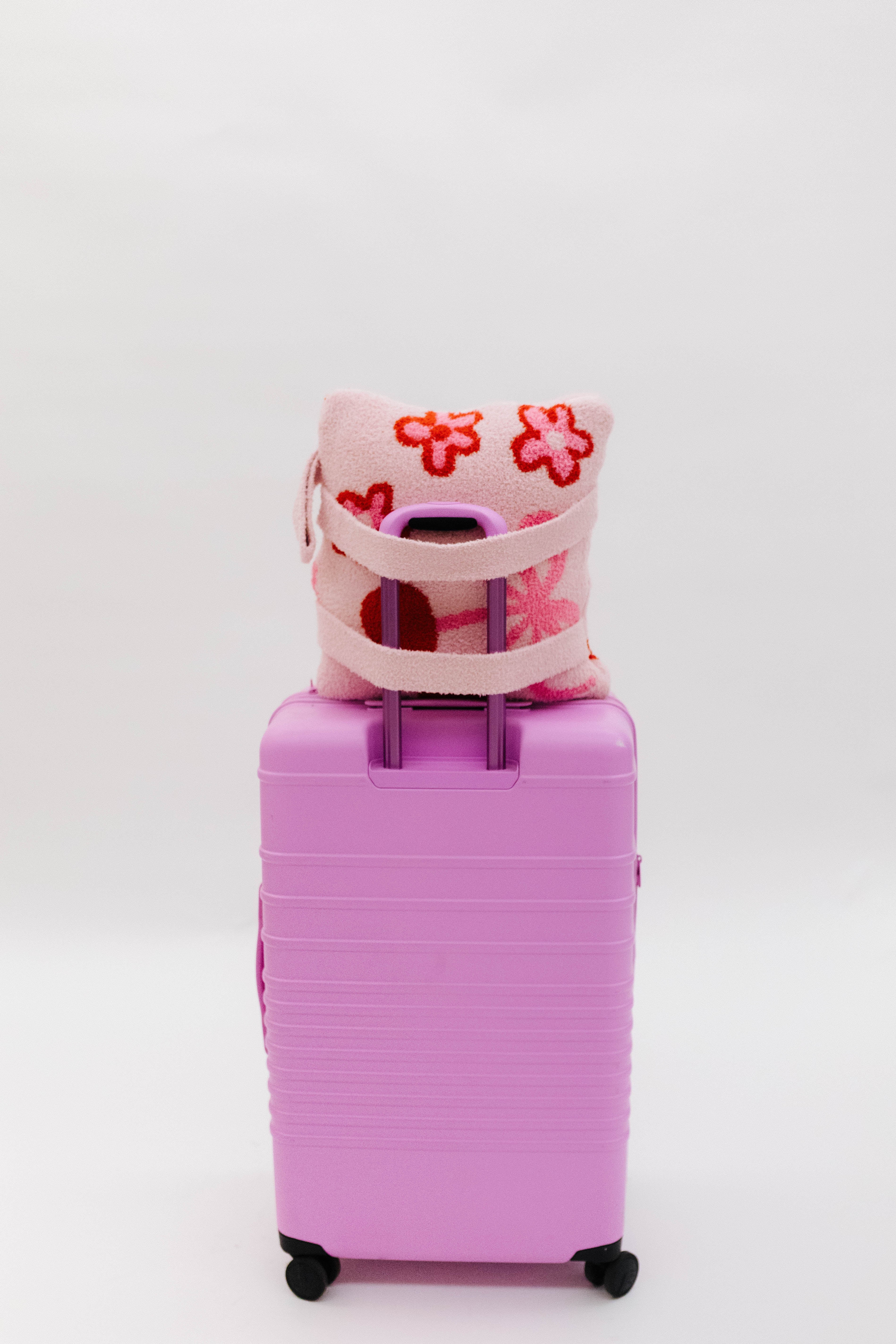 Love you quillow on pink suitcase
