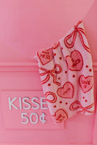 Blanket with bow and heart pattern that says hot mess, 2 much, IYKYK, Love U, Nap PLZ