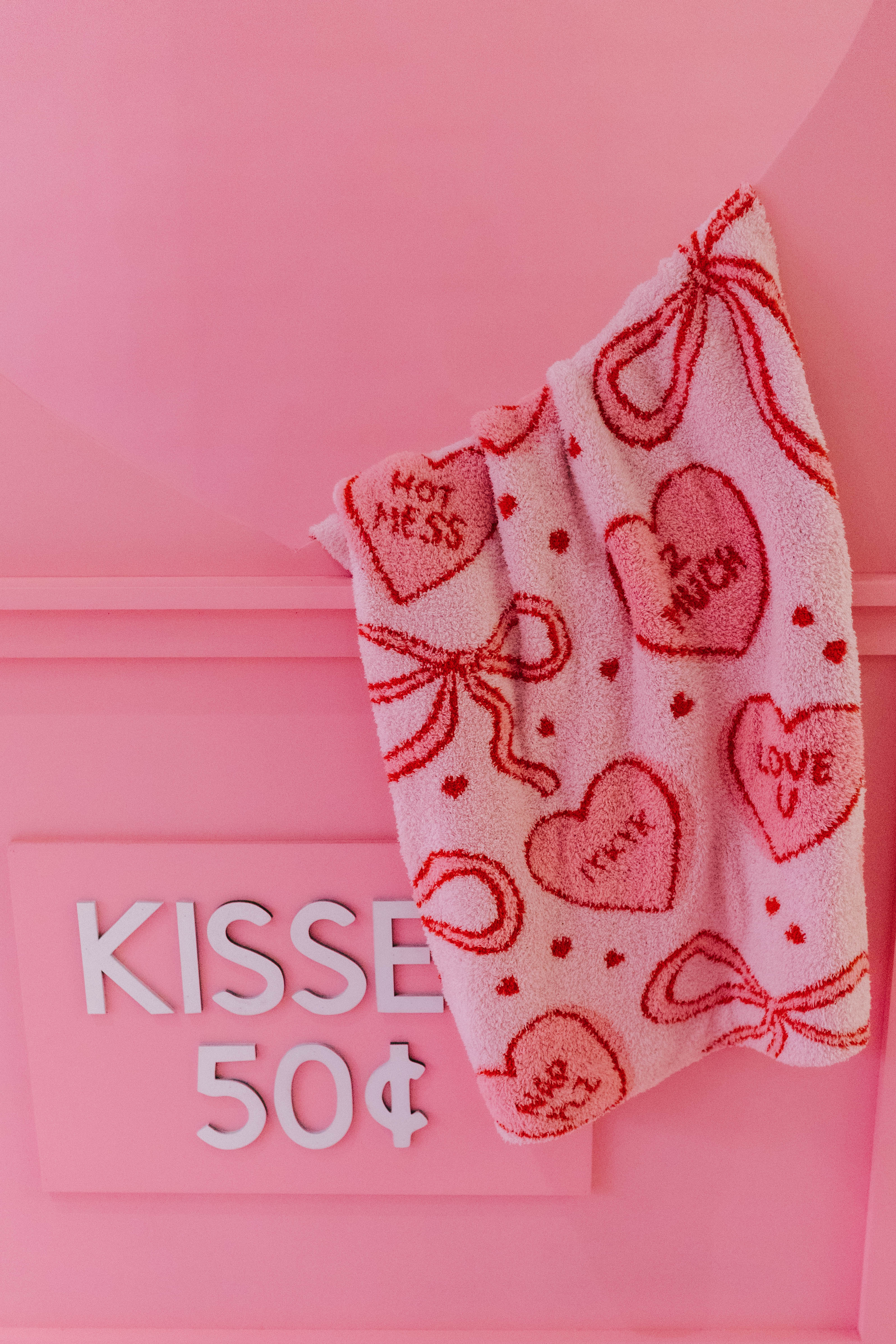 Blanket with bow and heart pattern that says hot mess, 2 much, IYKYK, Love U, Nap PLZ