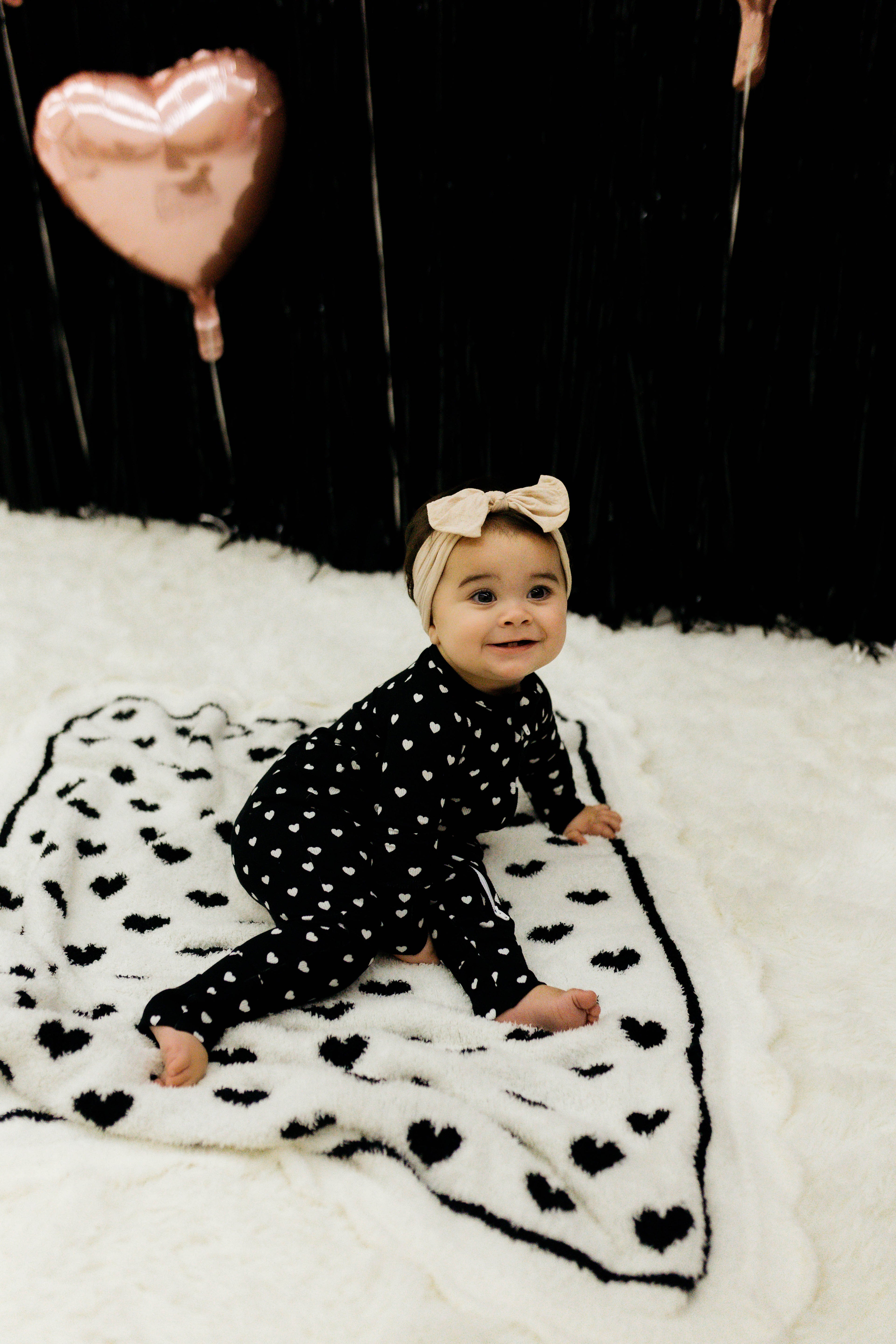 Baby on top of the blanket