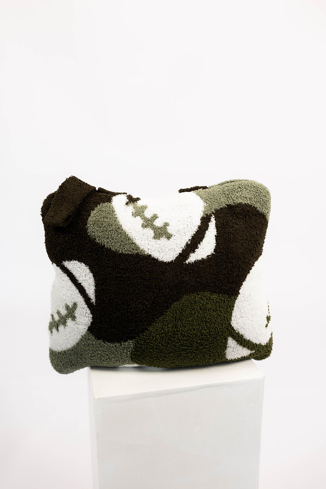 Quillow with football pattern on a white background