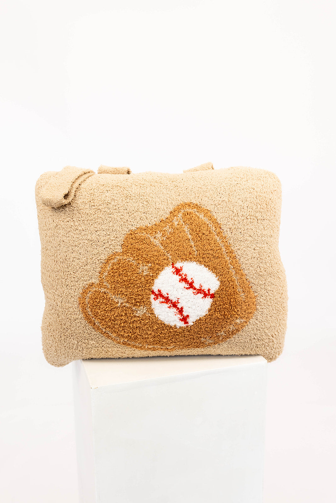 Beige quillow with a brown baseball glove and baseball design on a white background