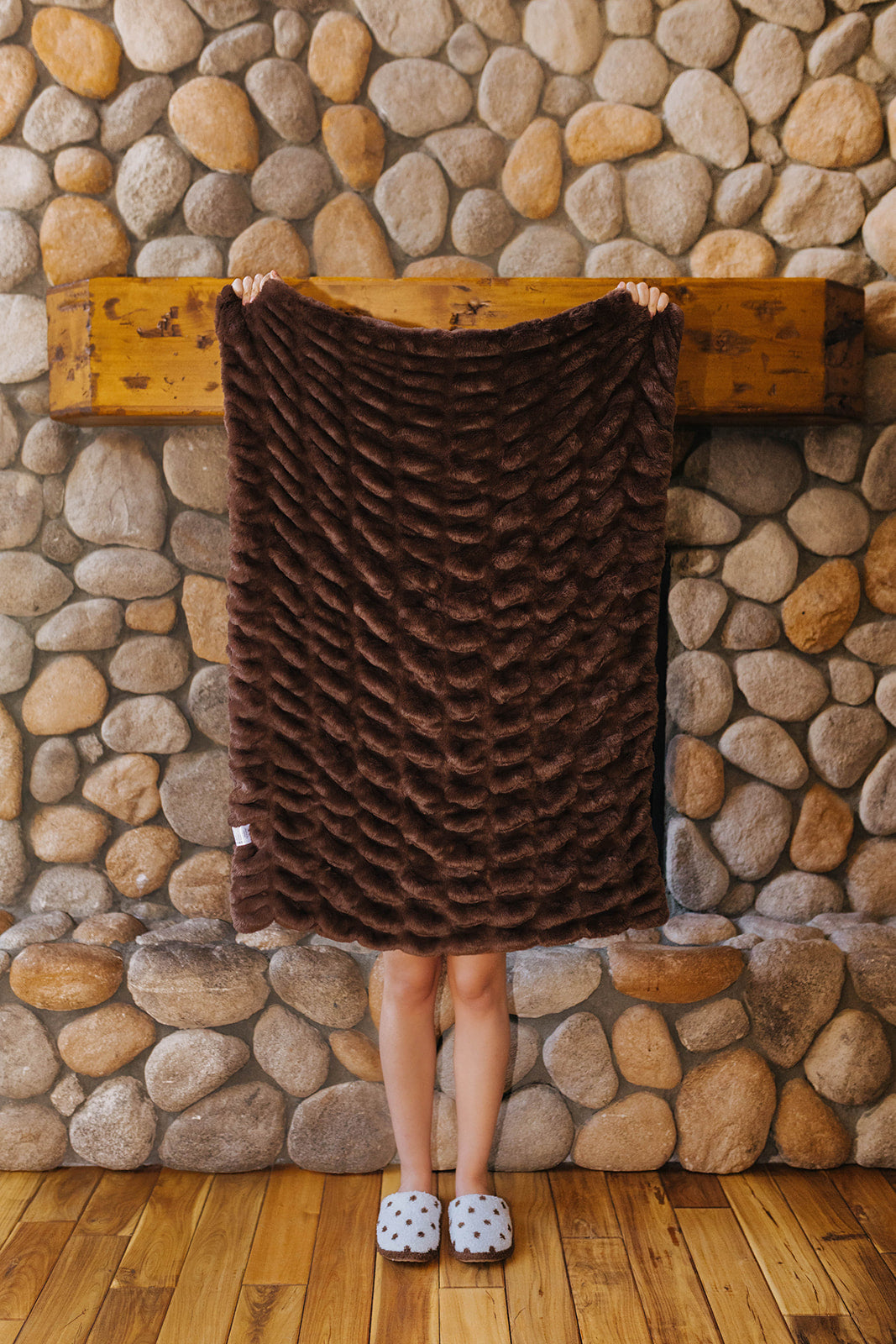 Brown faux fur kids blanket held open.