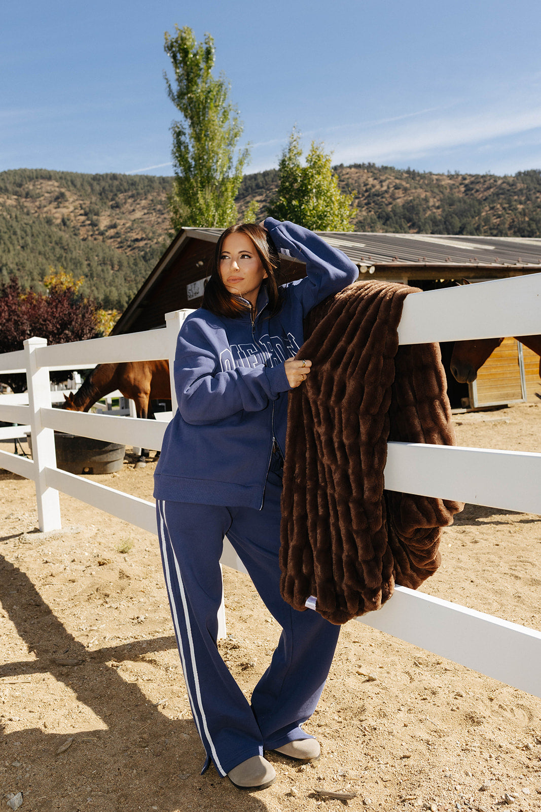 Fall Edit styling view featuring the blue Homebody zip sweatshirt.