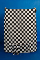 other side of black and white checkered picnic blanket 
