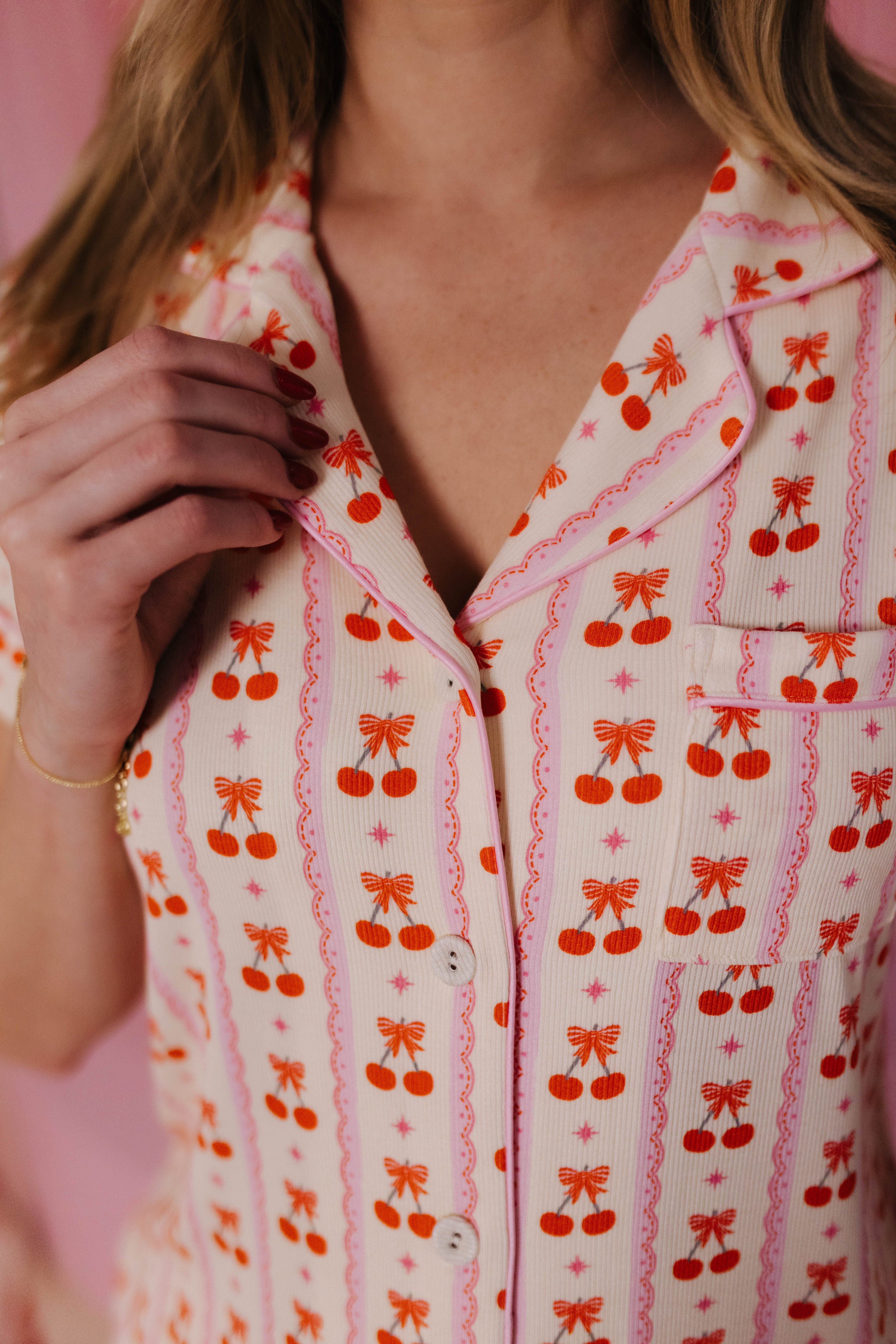 Details of the cherry bow pjs close up