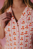 Details of the cherry bow pjs close up