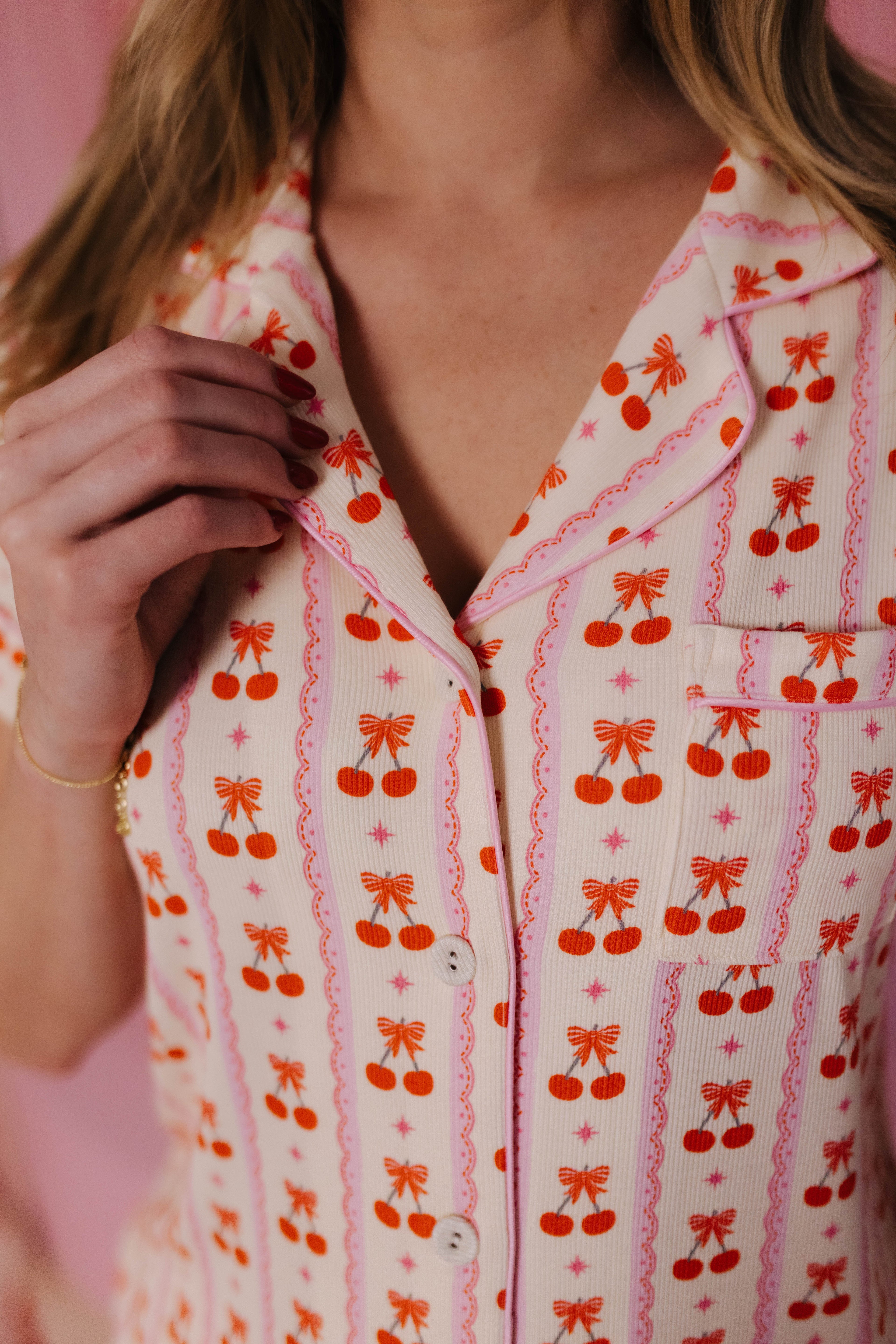 Details of the cherry bow pjs close up
