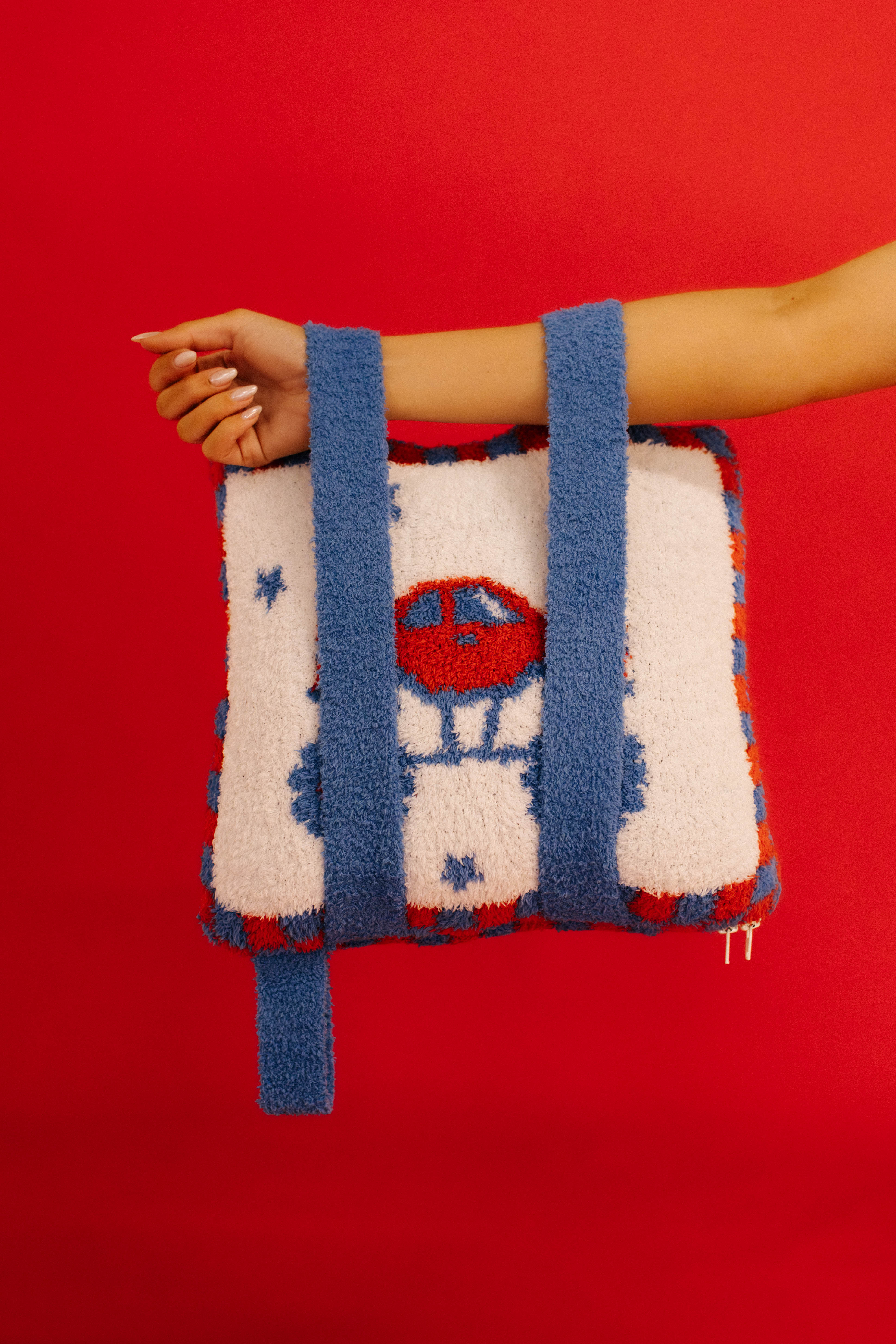 quillow being held by the blue straps