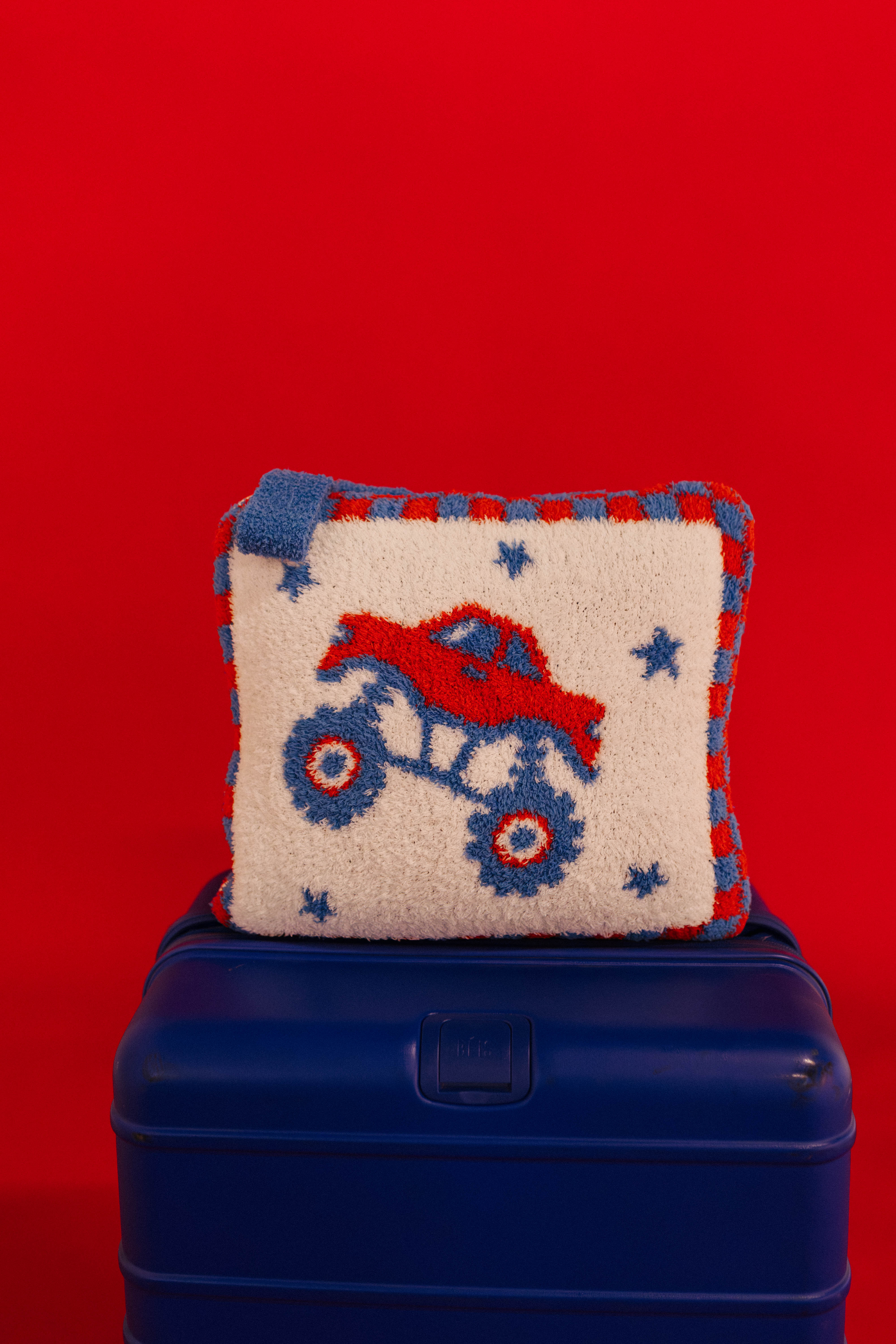 monster truck quillow on blue luggage 
