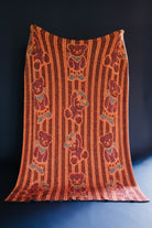 back of teddy blanket showing mostly red
