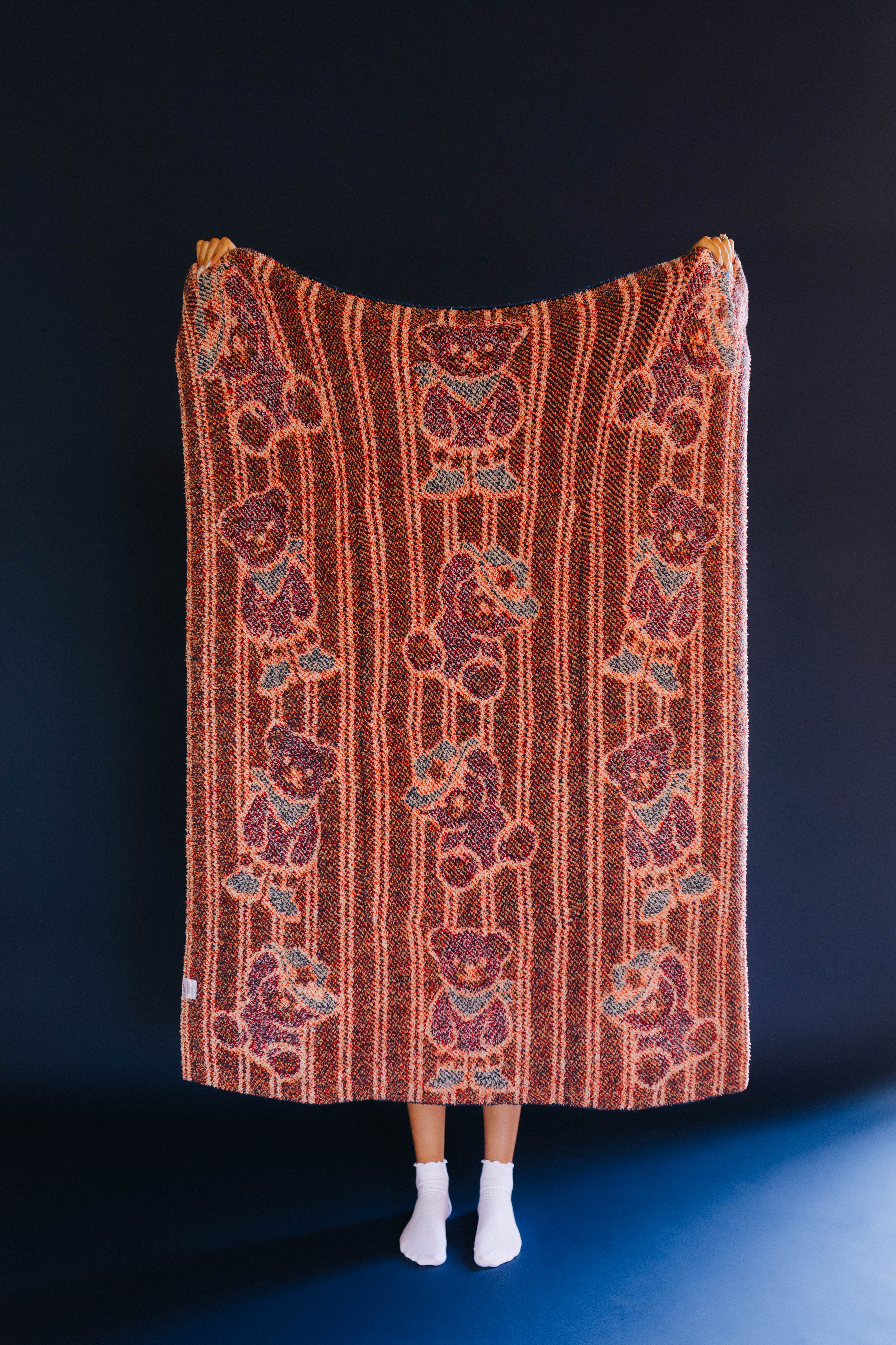 backside of the quillow showing mostly red side