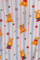 Pattern of teddy bears and stars on a striped background