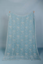 back of the blanket showing mostly blue weave