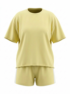 Light yellow t-shirt and shorts set on a white background