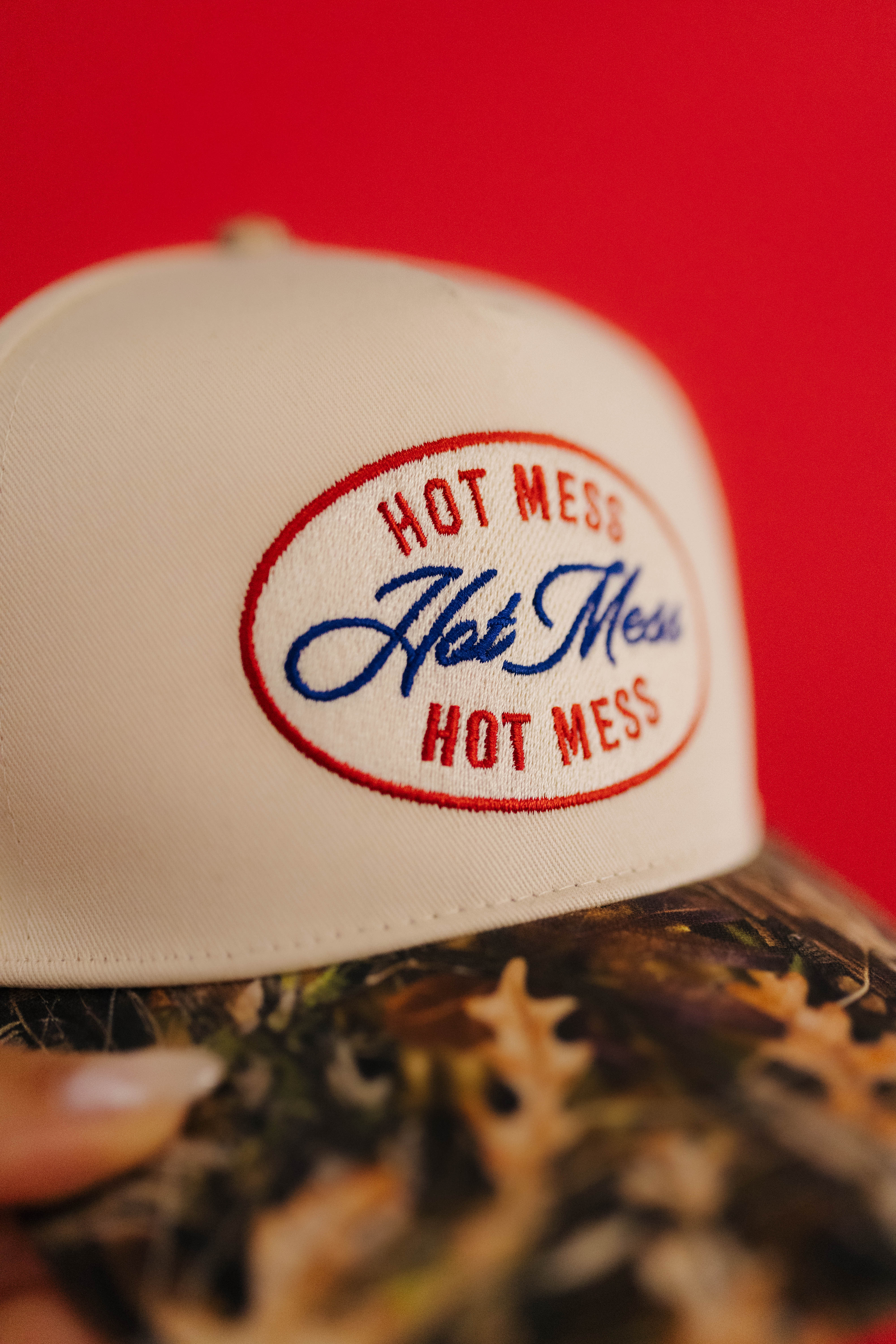 close up detail of the embroidery on the hat