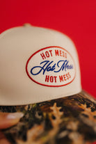 close up detail of the embroidery on the hat