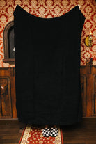 Black Waffle Quillow 50x60 shown in a closer detail view