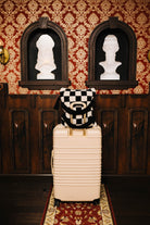 Sand & Black Check Quillow 50x60 shown in a closer detail view