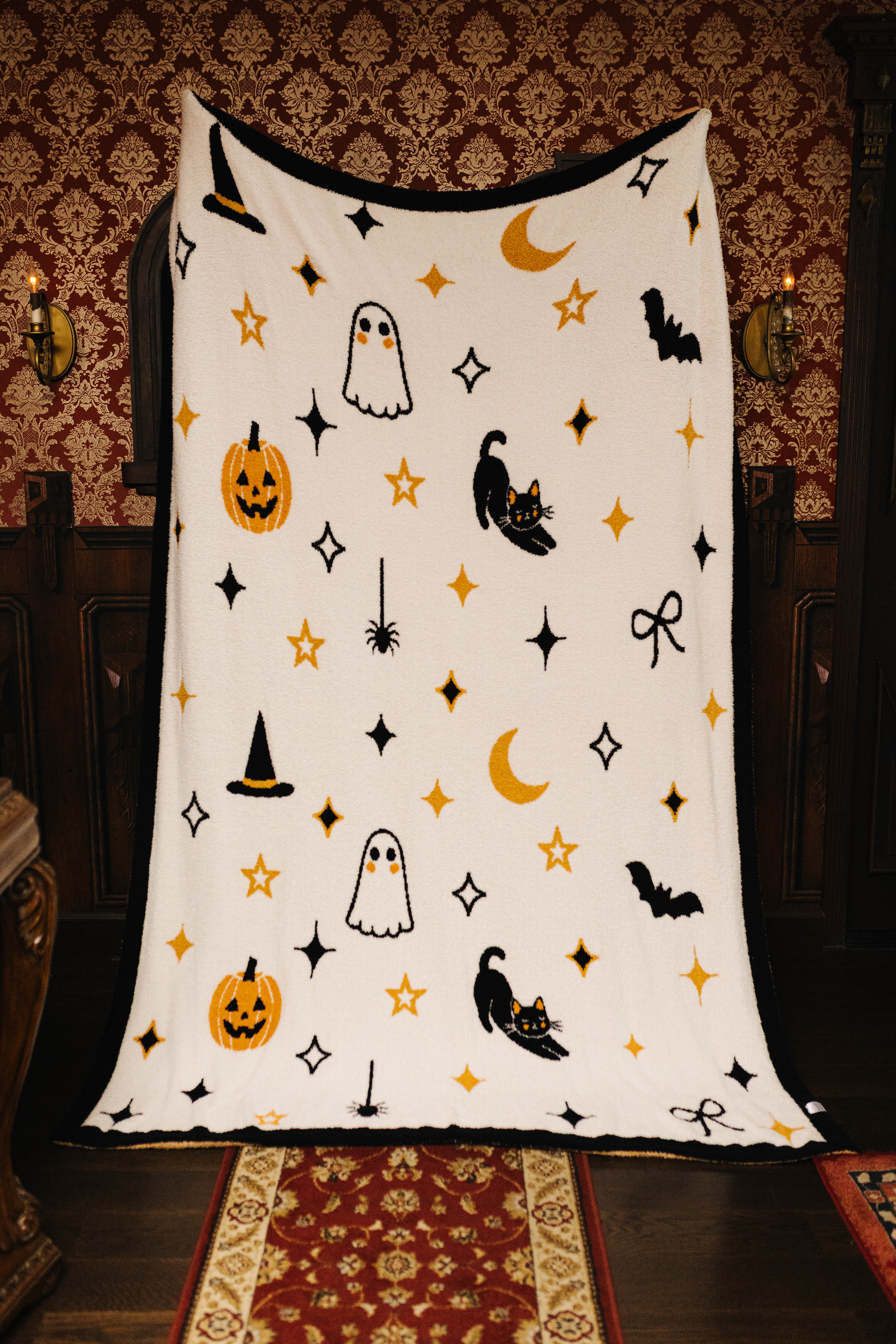 Halloween Icon Print blanket held open to show its full design