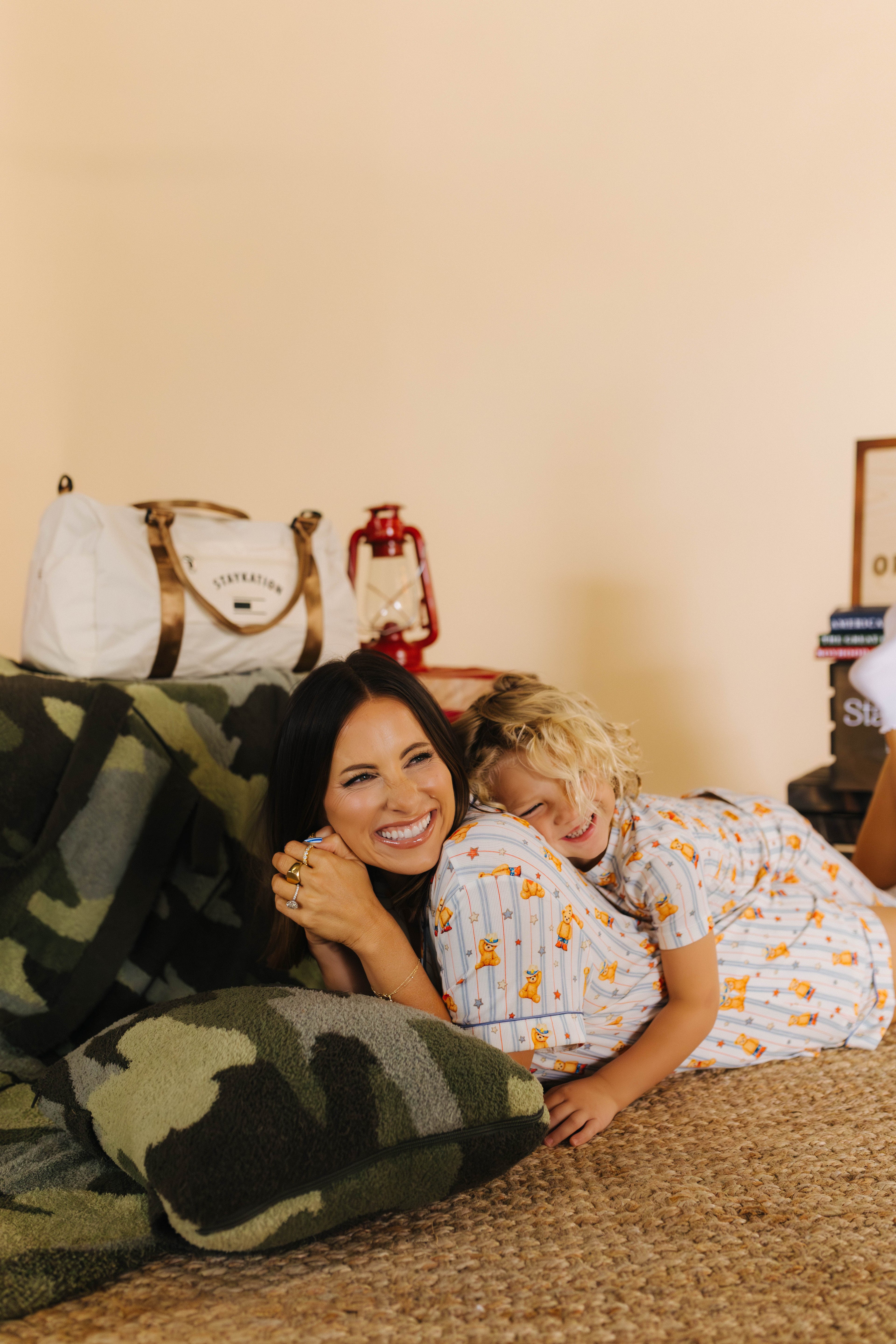 Kamp and Krista snuggling on the camo quillow