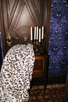 Leopard Faux Fur Blanket 60x80 styled in the Halloween campaign setting