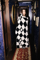 Ghost Check Blanket 60x80 shown from an alternate angle