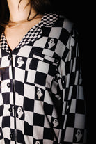 Close view of the collar and pocket on Ghost Check pajamas