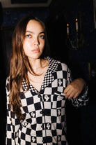 Adult Ghost Check Ribbed Pajama Set (Pockets) styled in the Halloween campaign setting