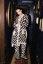Sand & Black Check Fluffy Robe shown in a full length lifestyle view