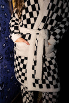 Sand & Black Check Fluffy Robe shown in a closer detail view