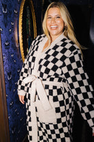 Sand and black check fluffy robe shown on another model