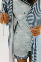 model showing inner ties on blue striped robe 