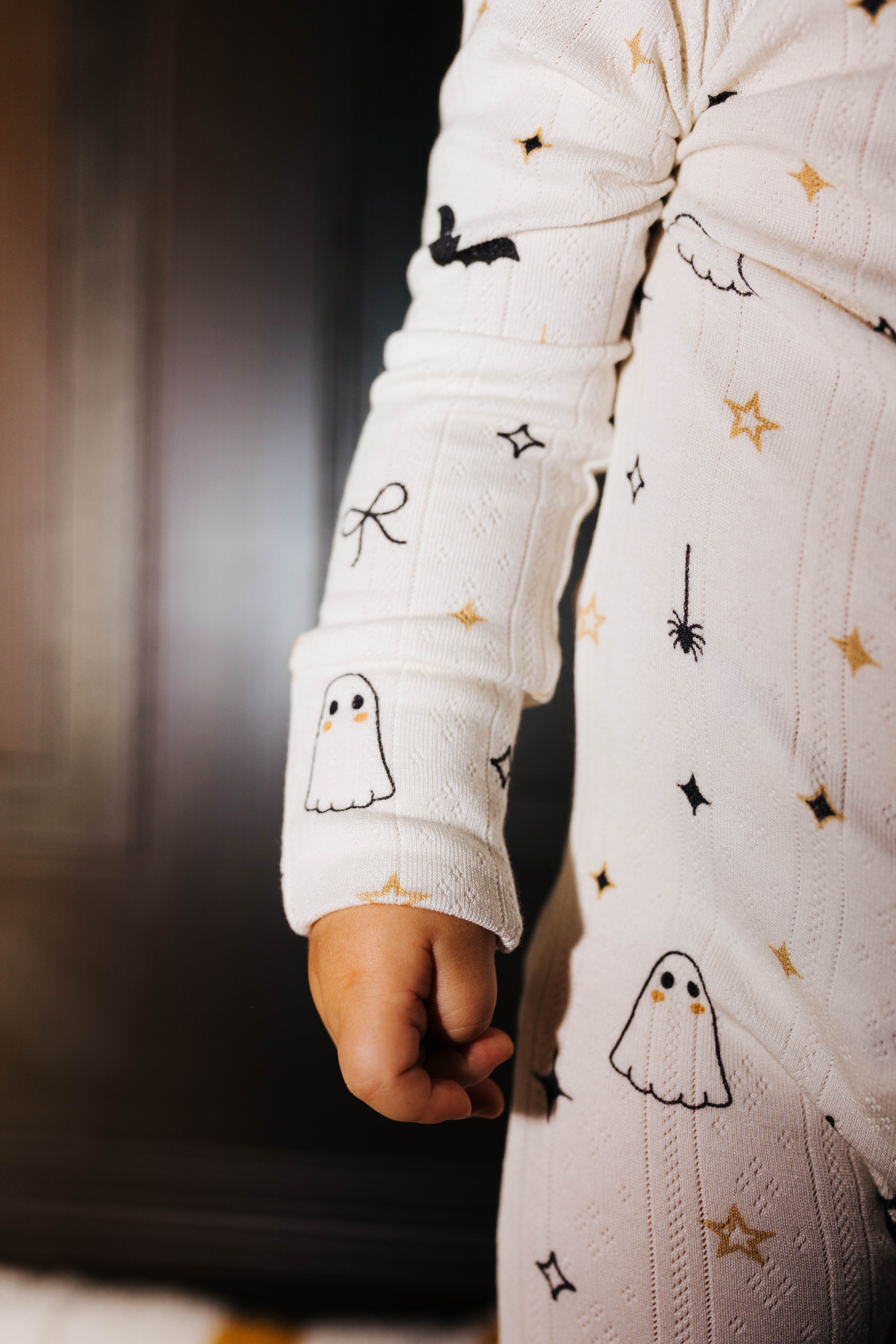 Close view of the sleeve cuff on Halloween Icon Print zip pajamas