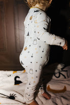 Back view of baby Halloween Icon Print zip pajamas