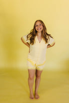 Malia in the size XS yellow pjs