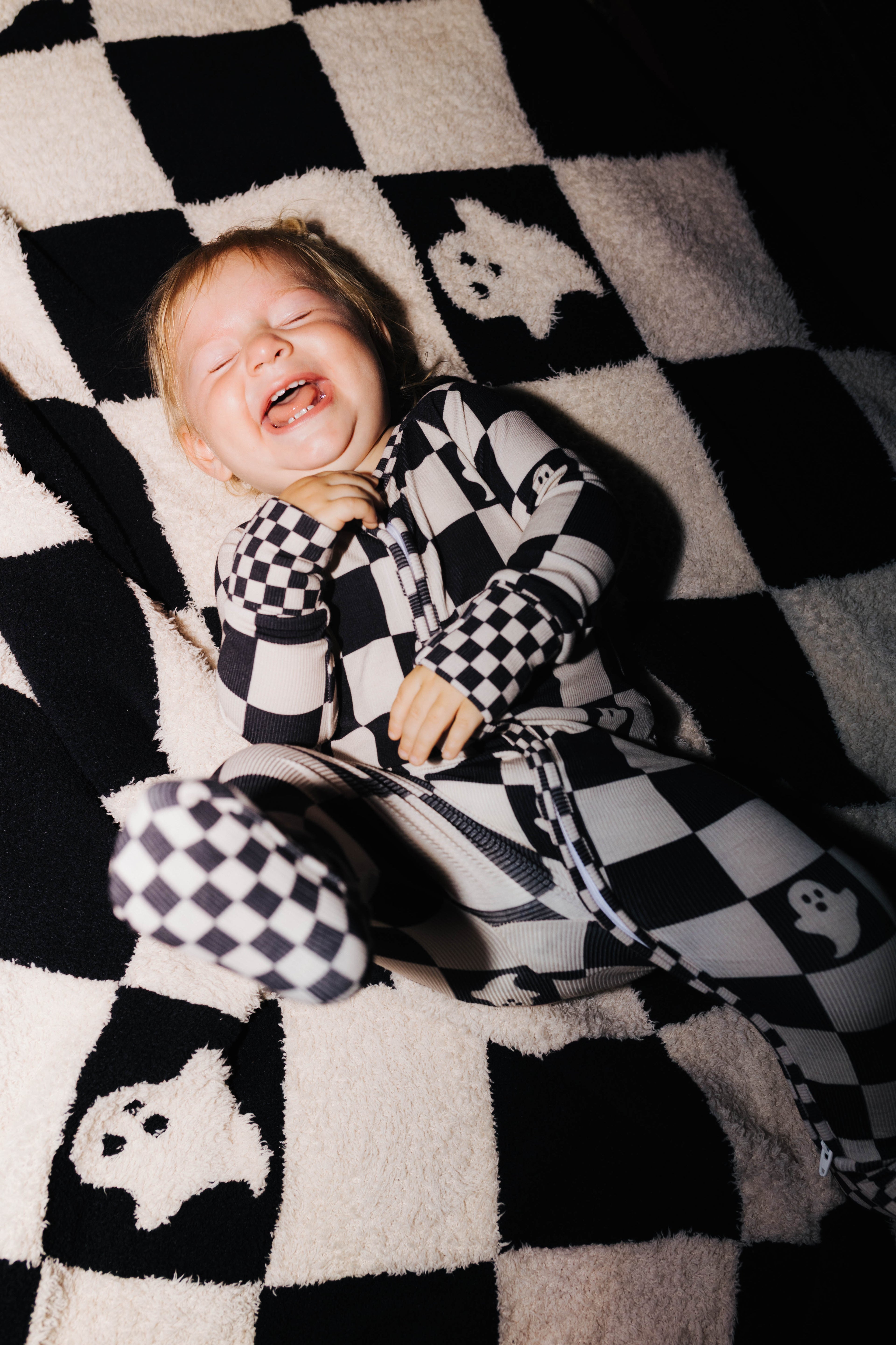 Baby Ghost Check Ribbed Zip Pajamas shown in a closer detail view