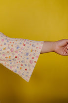 close up of the bell sleeve detail on the robe