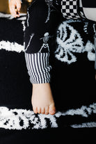 Striped ankle cuff on baby Skelly pajamas
