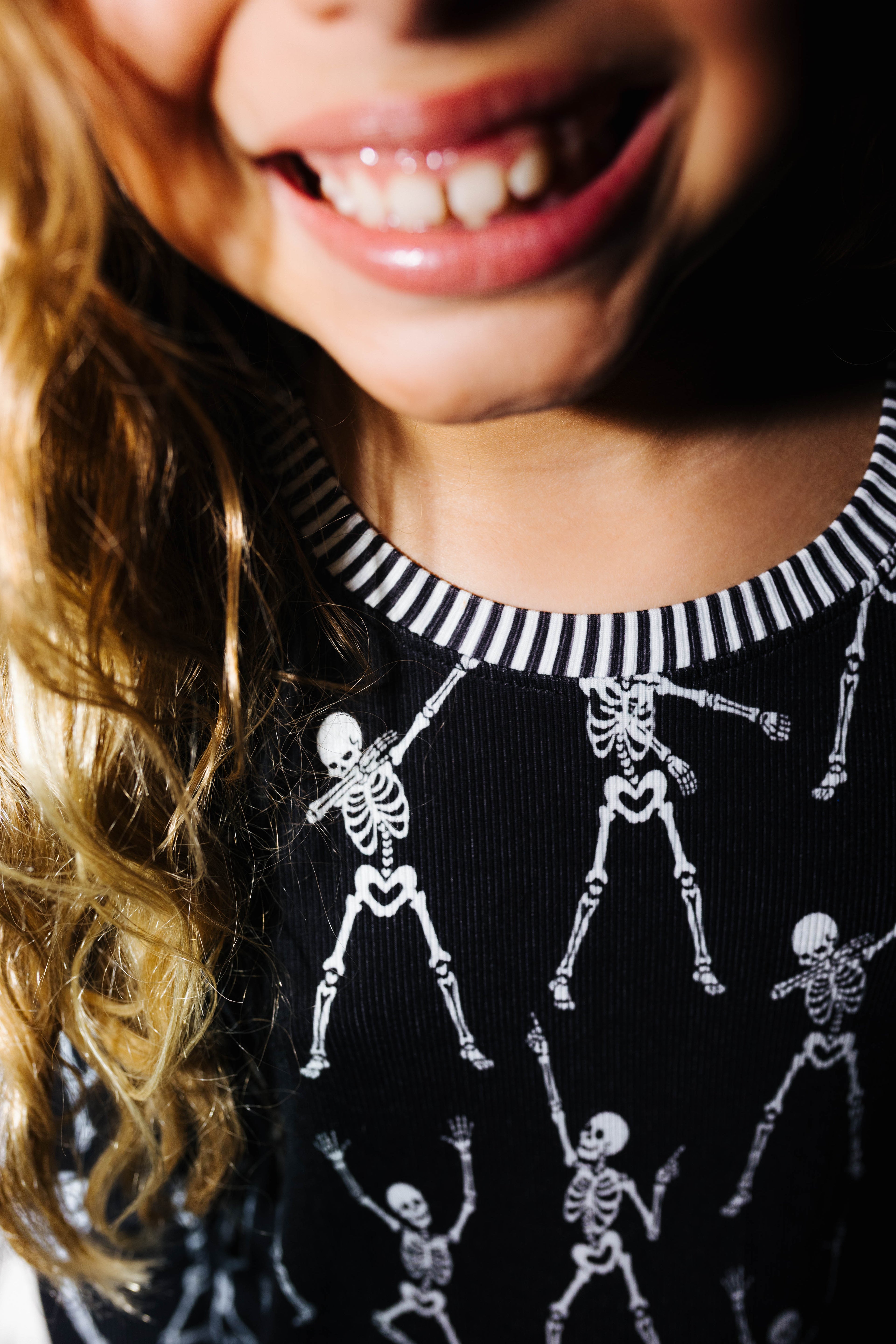 Striped neckline detail on kids Skelly pajamas