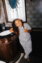 Kid Leopard Ribbed Pajama Set shown in a full length lifestyle view