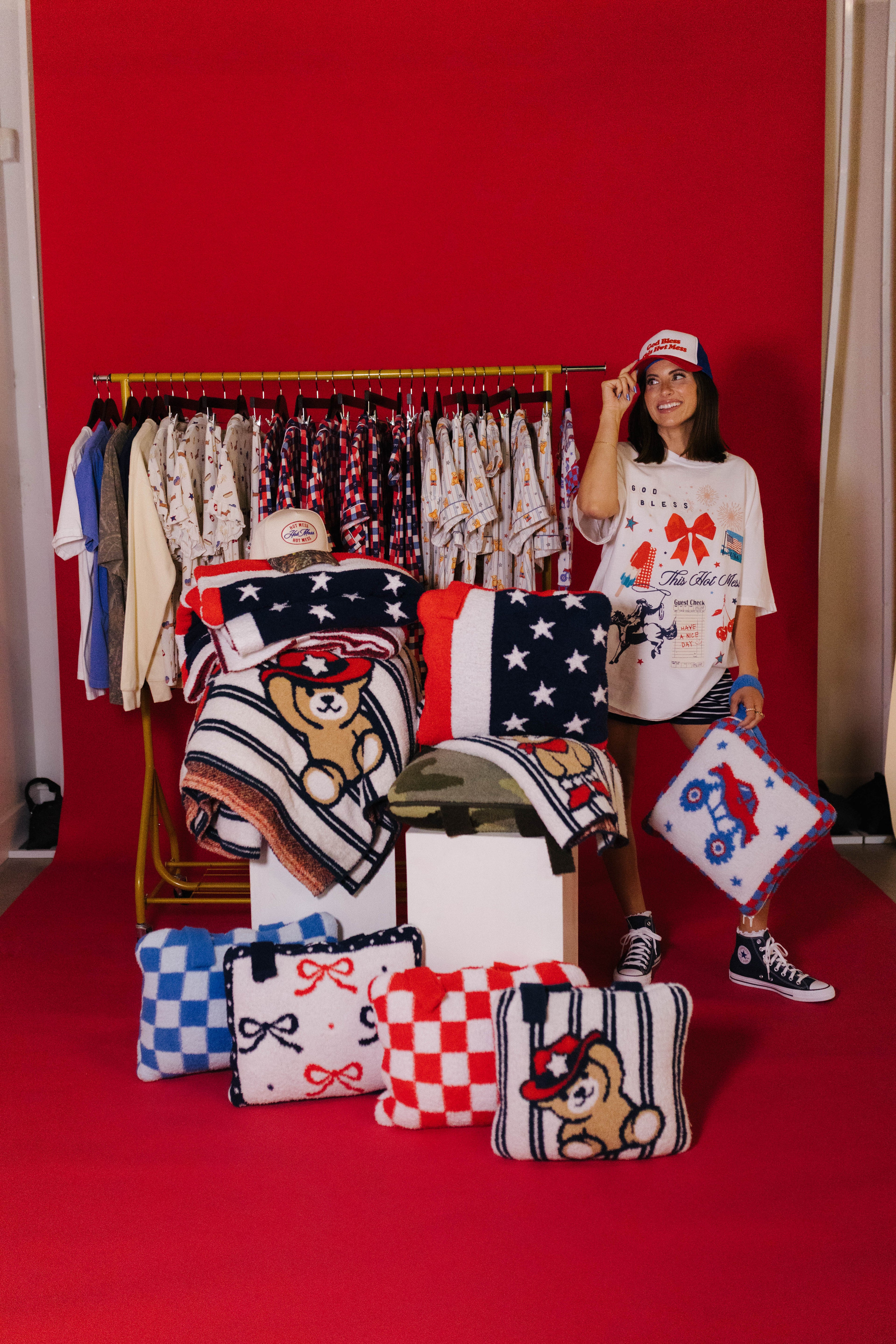 krista standing with the full home of the hot mess collection