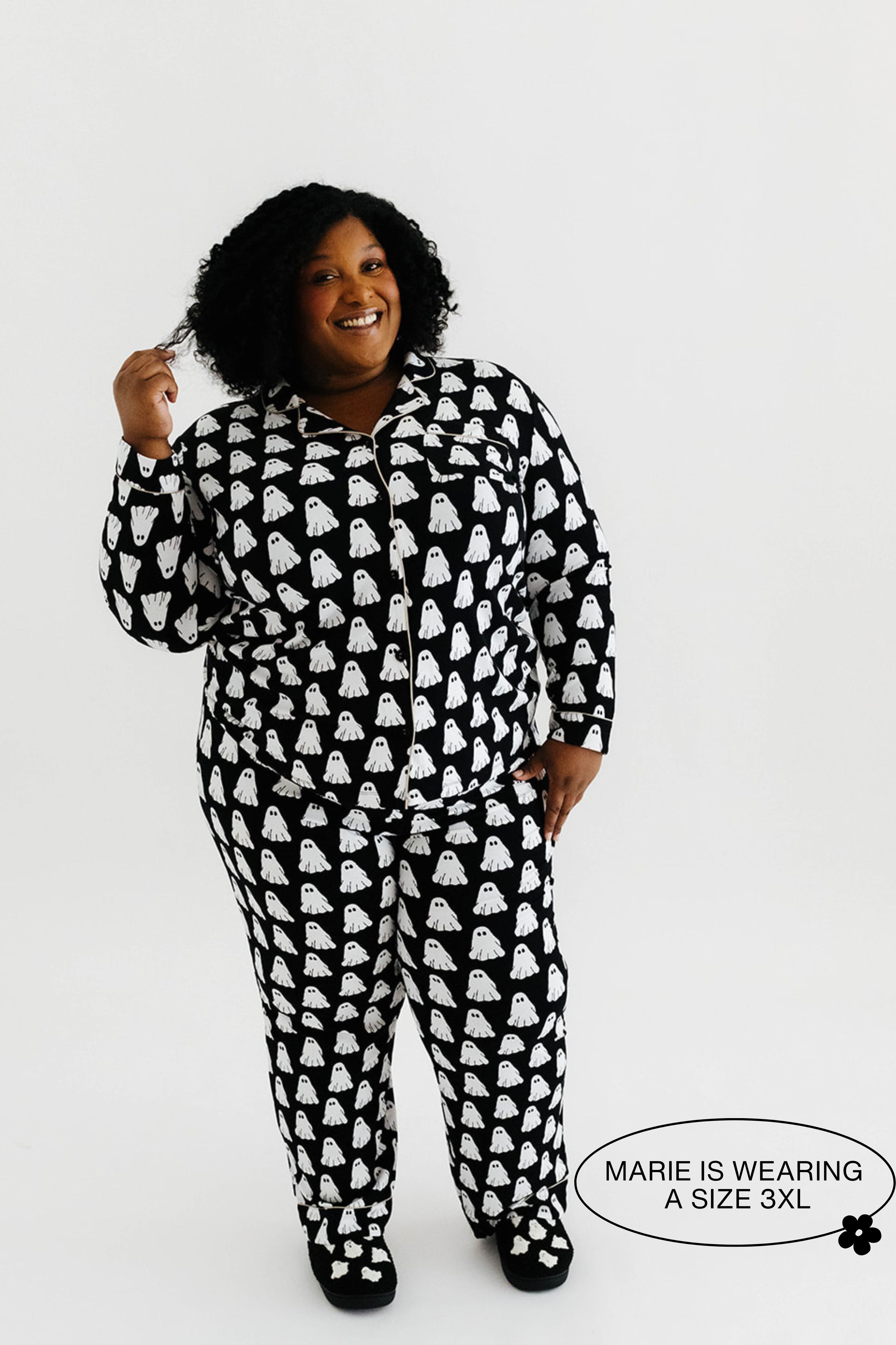 model mari smiling wearing the size 3x in the ghost pajamas