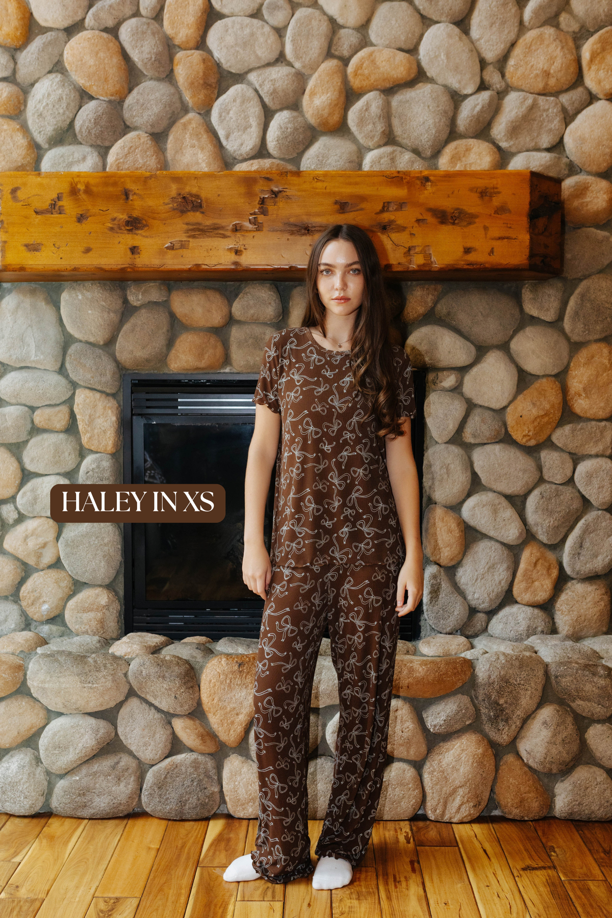 Sizing photo: Haley in XS wearing brown bow print pajama set.