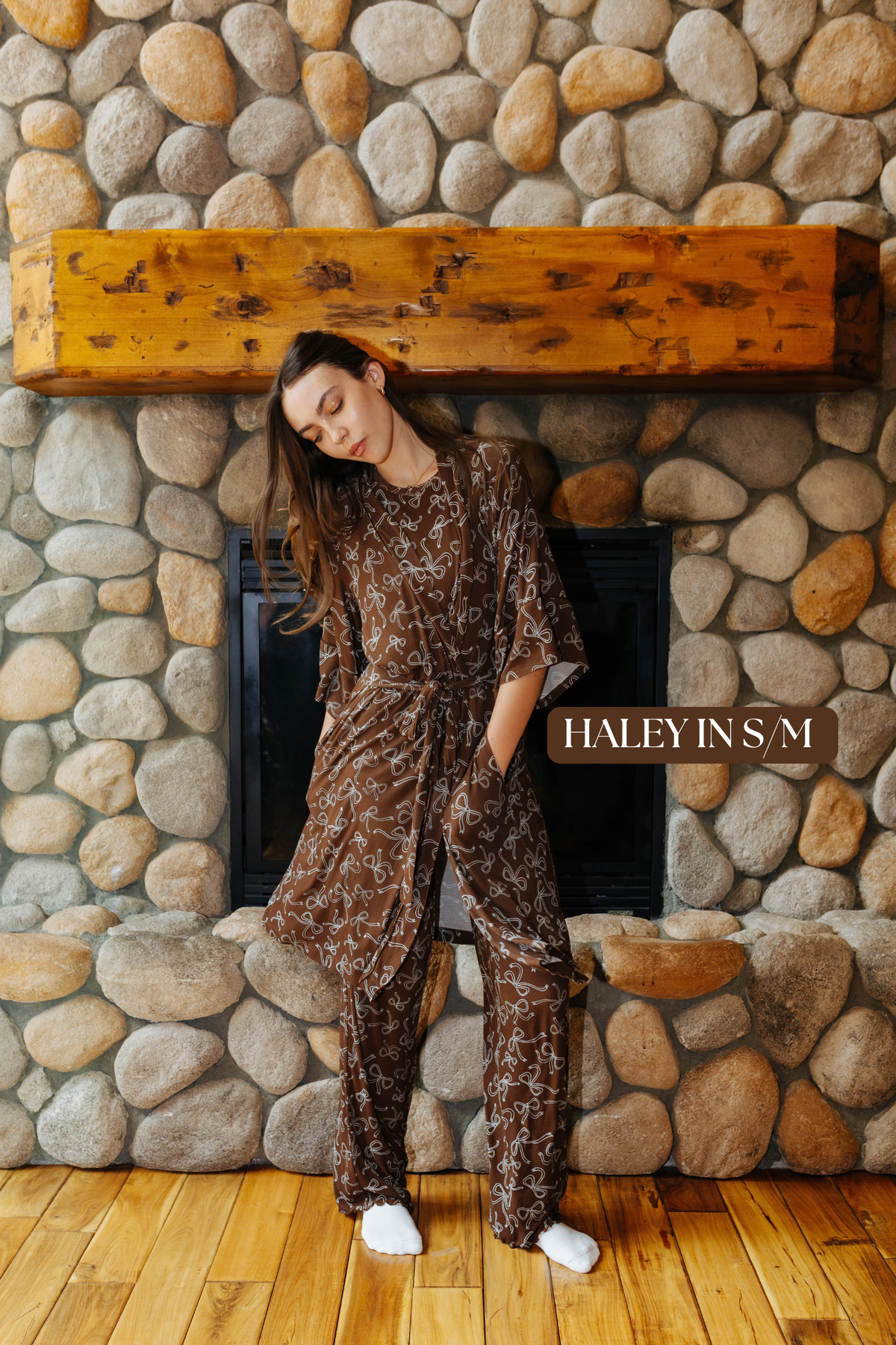 Sizing photo: Haley in S/M wearing the brown bow print robe over matching pajamas.