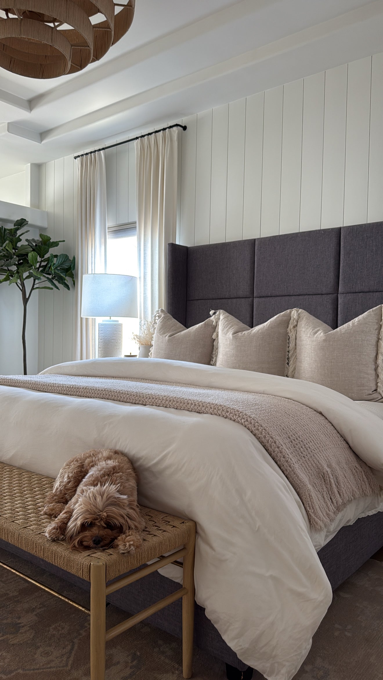 Picture of a bed with the sand waffle blanket styled on it